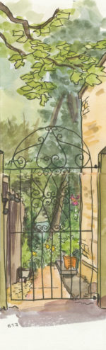 iron gate and garden beyond